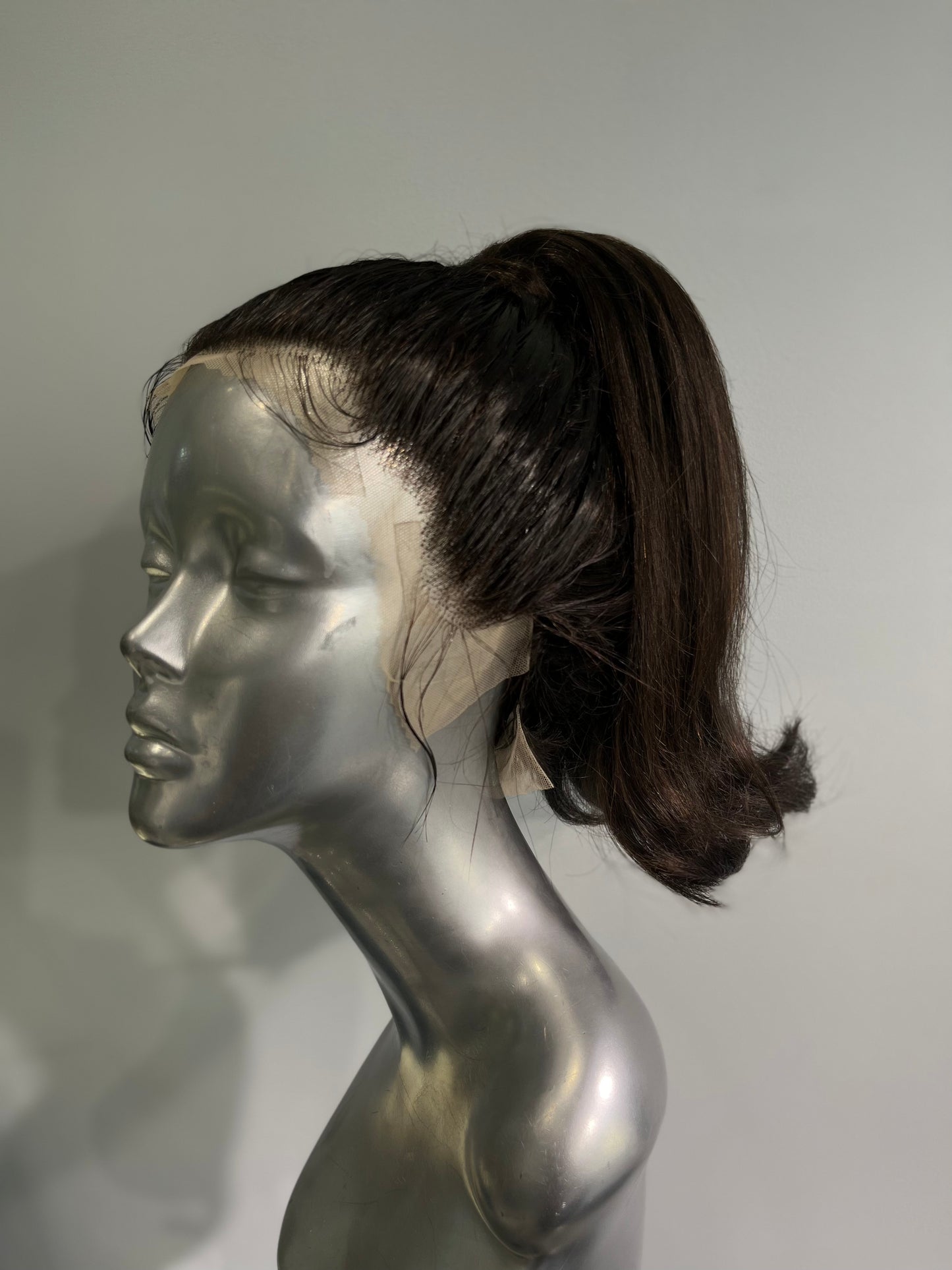 Flipped back ponytail front lace wig