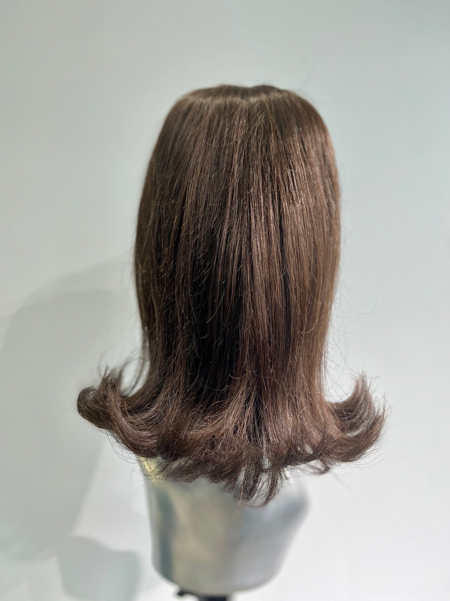 Flipped back ponytail front lace wig