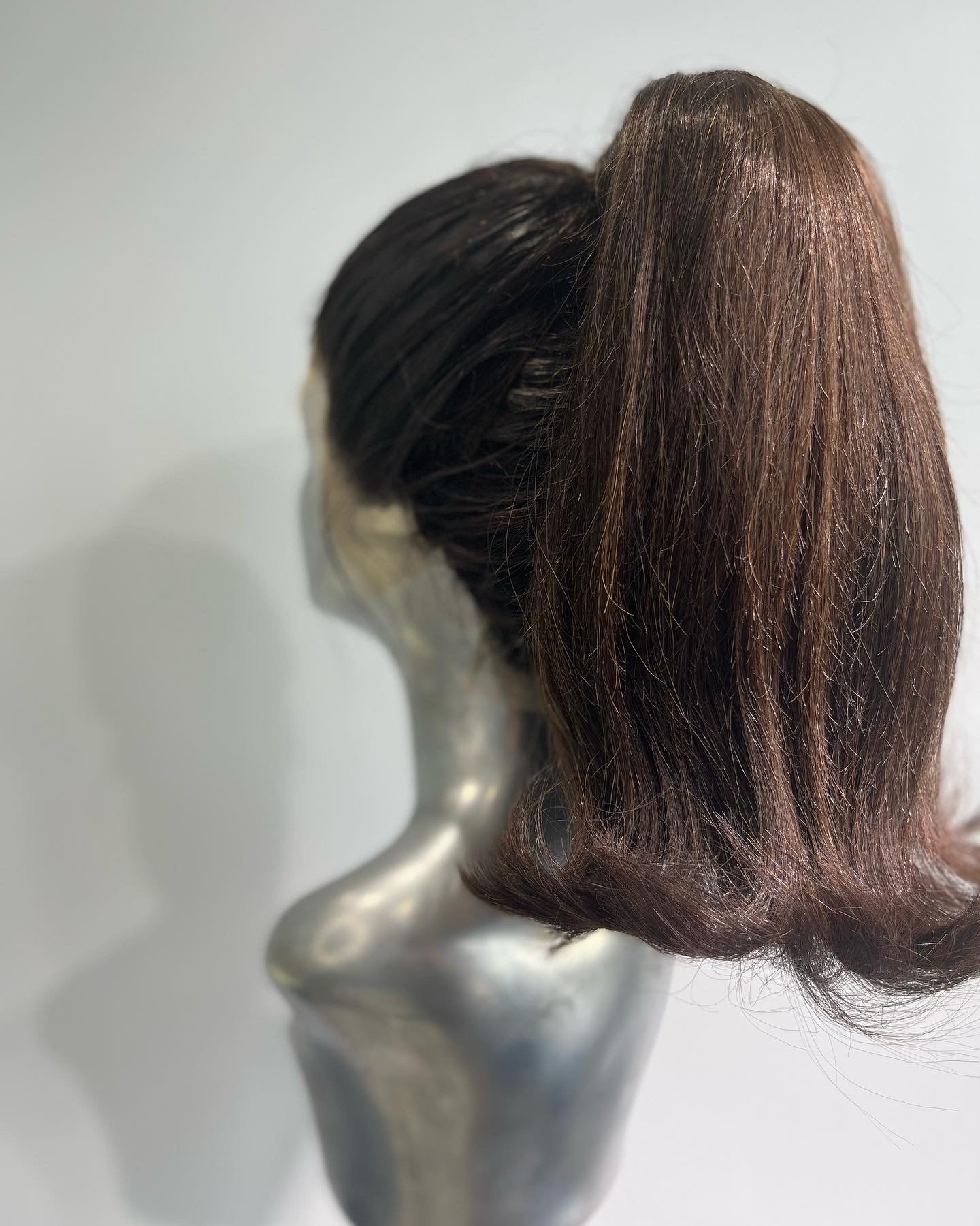 Flipped back ponytail front lace wig