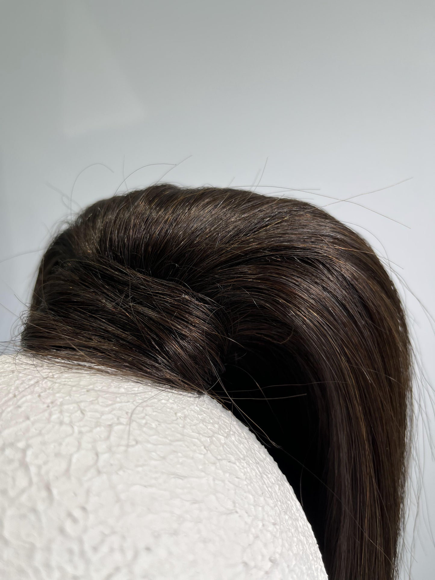 Flipped pony-tail velcro ponytail